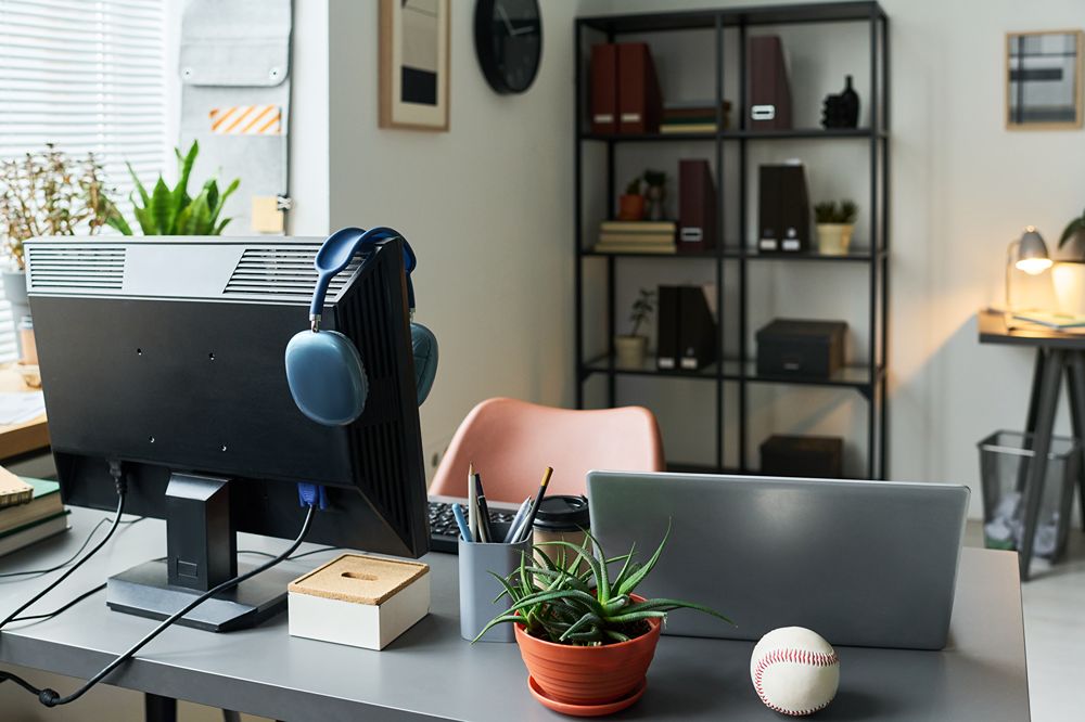 modern-home-office-workspace-with-computer-and-pot-2026-06-22-16-14-33-utc (2)